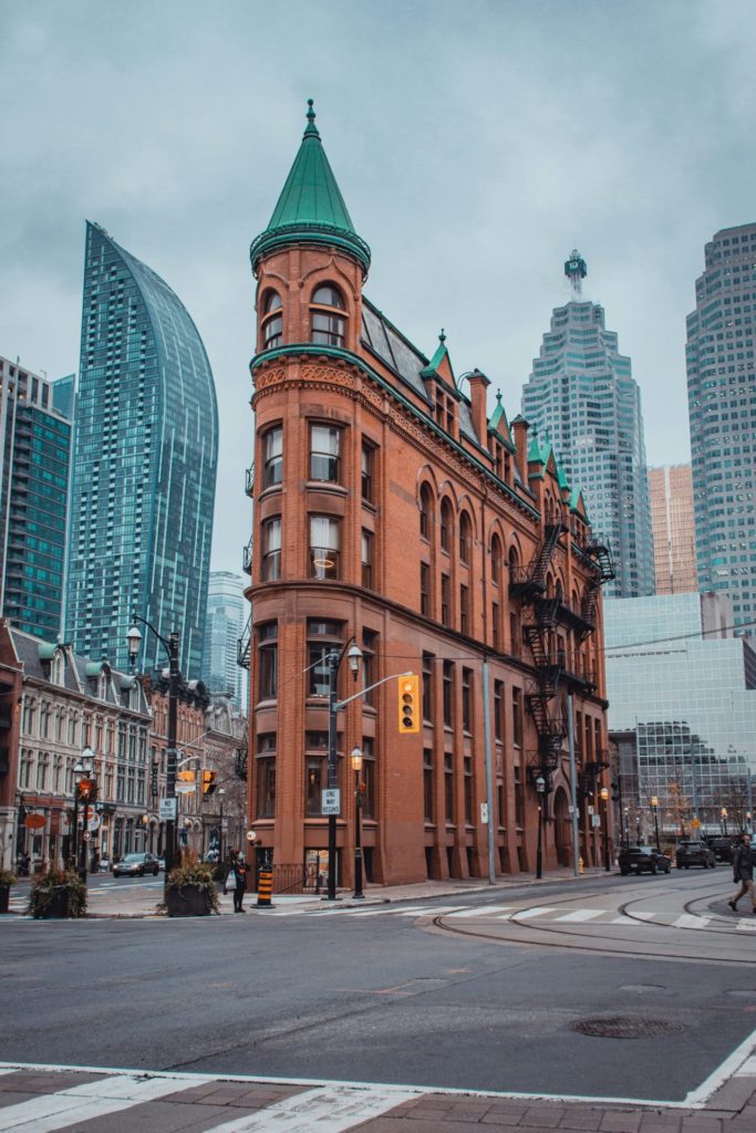 The Gooderham Building in Toronto with the L Tower visible in the background.